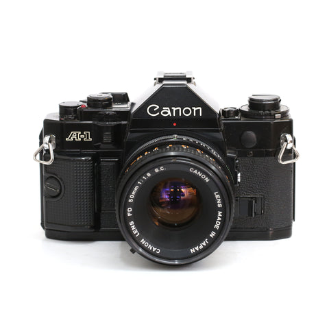Canon A-1 svart + FD 50/1,8
